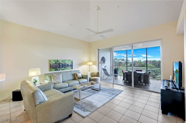 living room with ceiling fan and light tile patterned floors