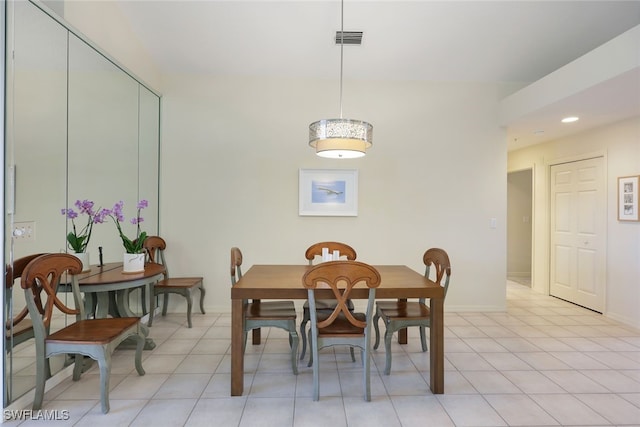 dining room featuring light tile patterned floors