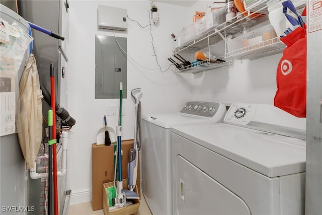 laundry area with laundry area, electric panel, and independent washer and dryer