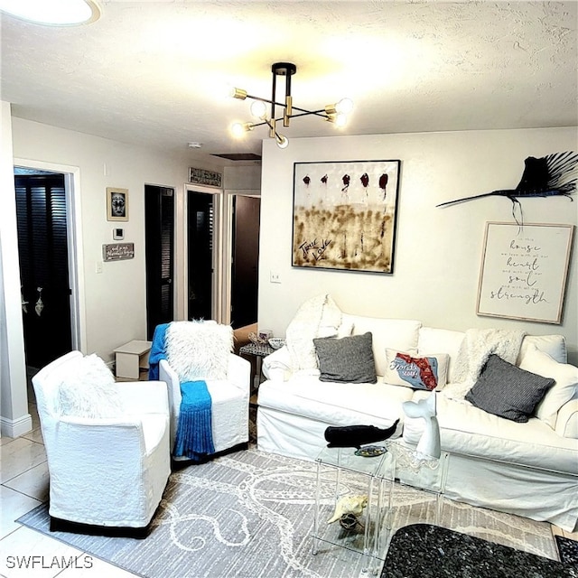 tiled living room with a chandelier