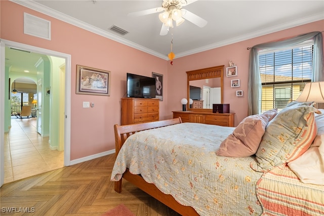 bedroom with ceiling fan, ornamental molding, and light parquet floors