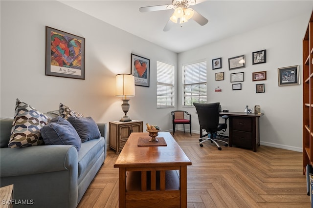 office featuring ceiling fan and light parquet flooring