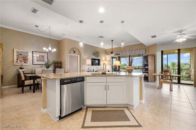 kitchen featuring white cabinets, ceiling fan with notable chandelier, stainless steel dishwasher, and an island with sink