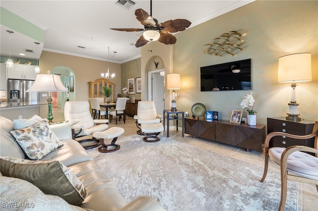 living room with ceiling fan with notable chandelier, ornamental molding, and light tile patterned flooring