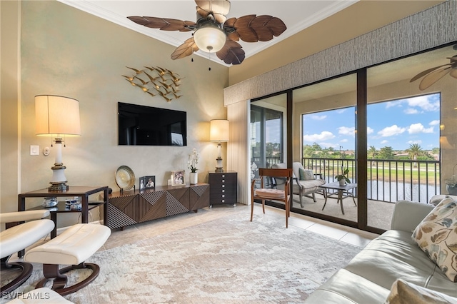 living room with crown molding and light tile patterned flooring