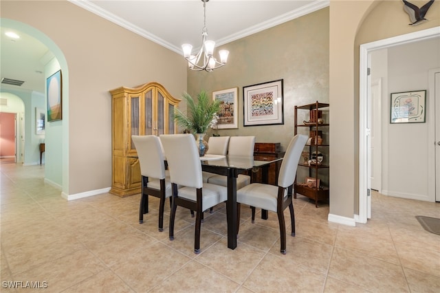 tiled dining room featuring crown molding and an inviting chandelier