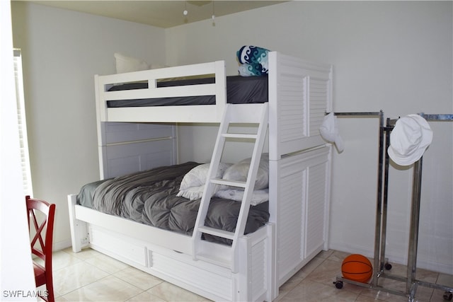 bedroom with light tile patterned flooring