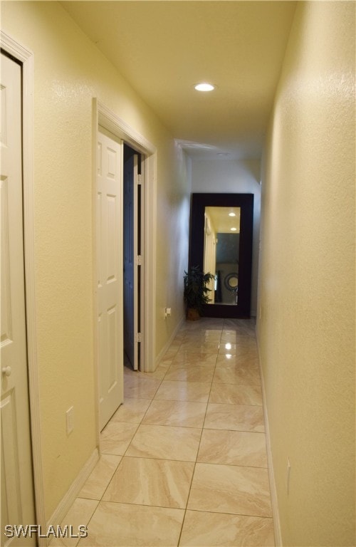 corridor with washer / dryer