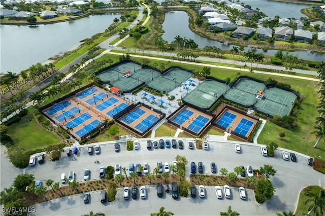 drone / aerial view with a water view