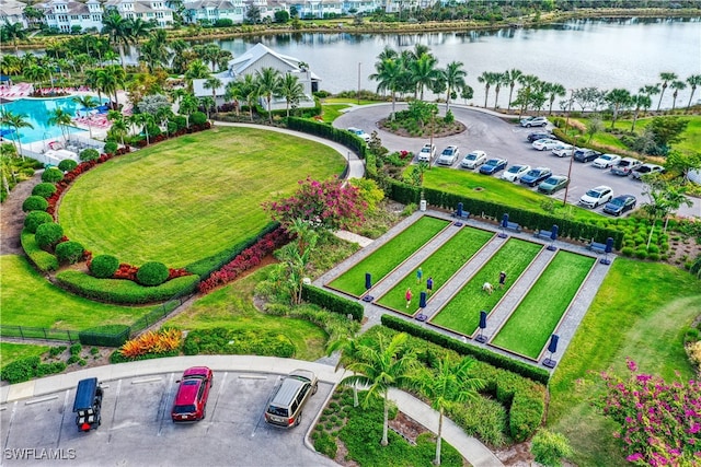 birds eye view of property featuring a water view