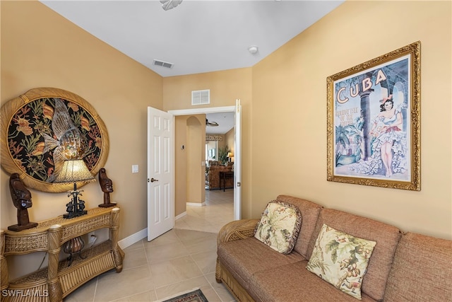 living room with light tile patterned flooring