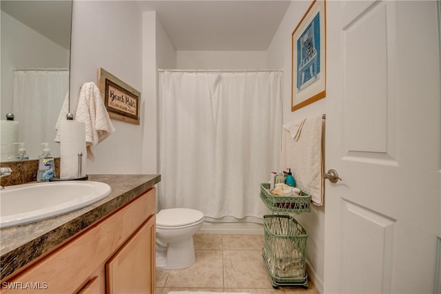 full bathroom featuring shower / tub combo with curtain, vanity, toilet, and tile patterned flooring