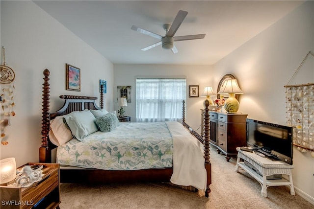 bedroom featuring ceiling fan and carpet floors