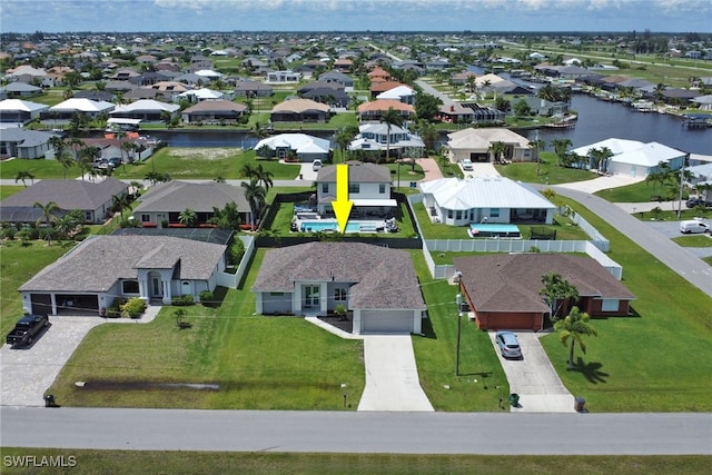 bird's eye view with a water view