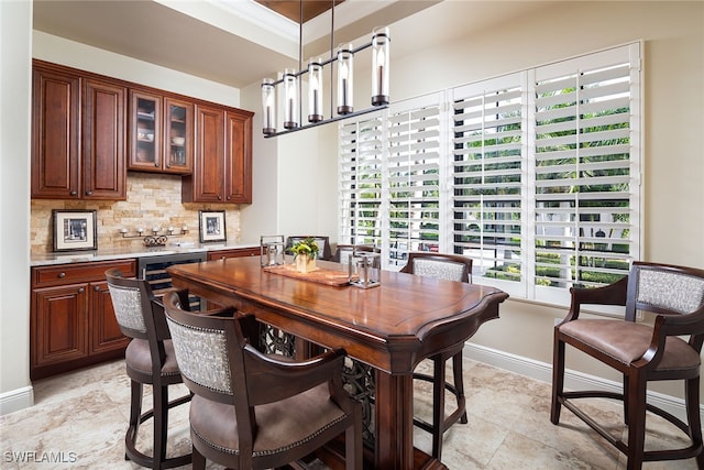 dining area with crown molding