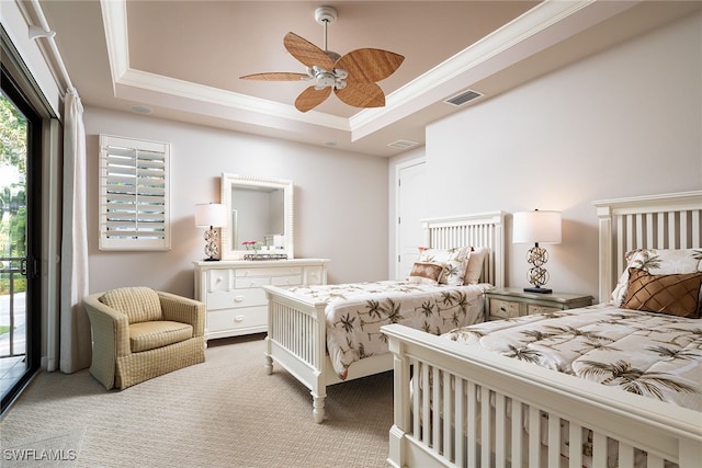 bedroom featuring access to exterior, ornamental molding, a raised ceiling, ceiling fan, and carpet floors