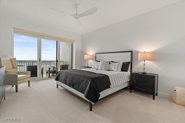 carpeted bedroom featuring access to outside and ceiling fan