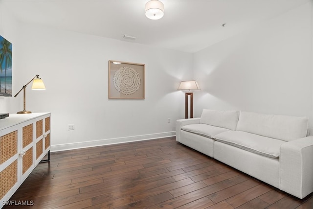 living room with dark hardwood / wood-style floors