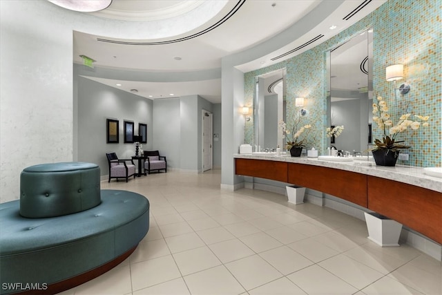 bathroom featuring tile patterned flooring and vanity