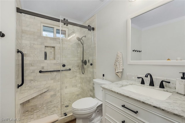 bathroom with vanity, toilet, walk in shower, and crown molding