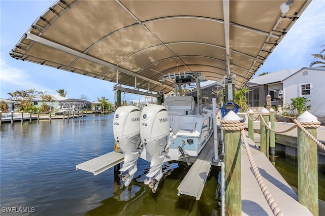 dock area featuring a water view