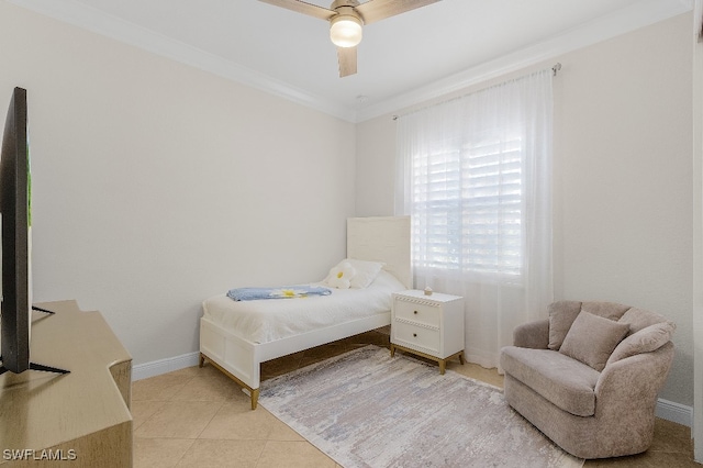 bedroom with ceiling fan, light tile patterned flooring, and ornamental molding