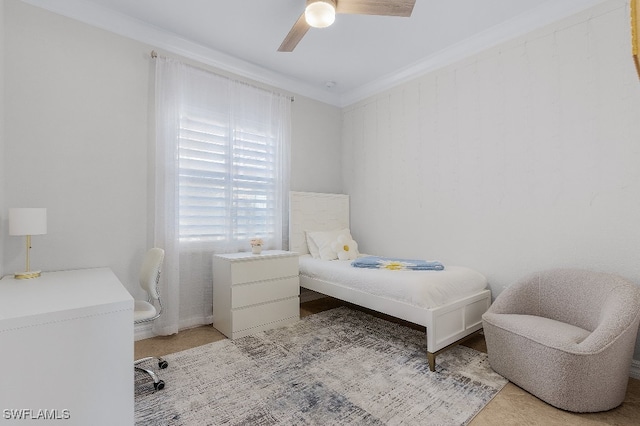 bedroom with ceiling fan, light colored carpet, and crown molding