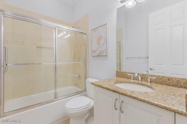 3741 Pleasant Springs Dr, Naples, FL 34119 - full bathroom with combined bath / shower with glass door, vanity, and toilet