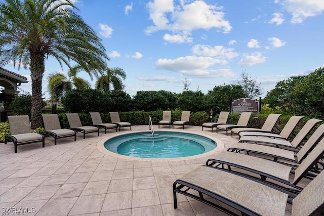 view of swimming pool featuring a patio