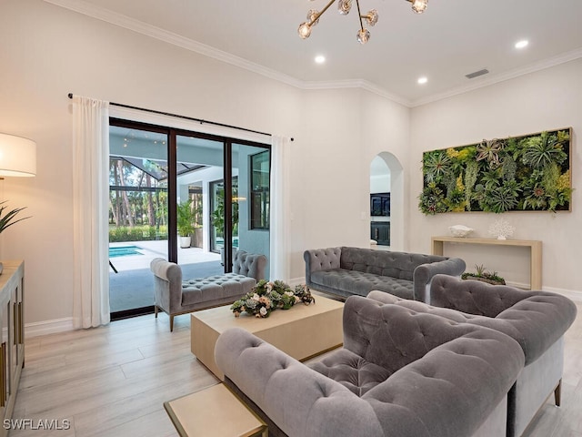 living room featuring light hardwood / wood-style flooring and ornamental molding