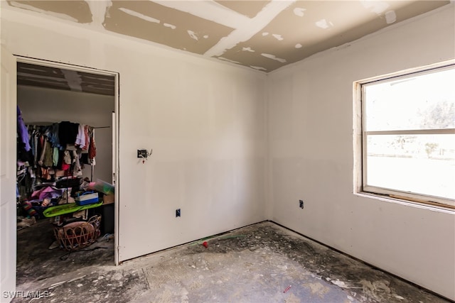 unfurnished bedroom featuring a closet