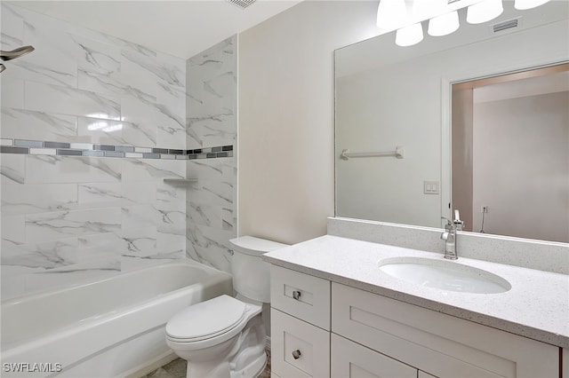 full bathroom with vanity, toilet, and tiled shower / bath combo