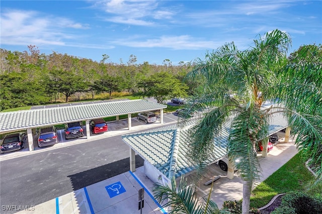 view of pool featuring a carport