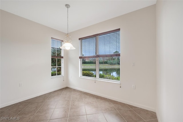 spare room featuring tile patterned floors