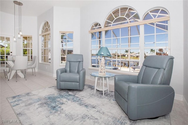 interior space featuring a healthy amount of sunlight and tile patterned floors