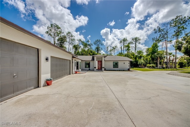 view of front of property with a garage