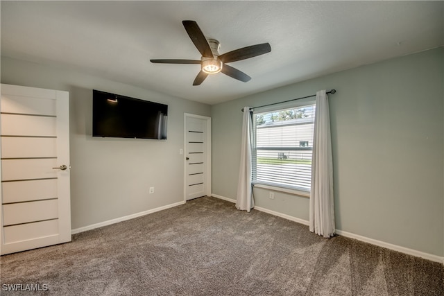 unfurnished bedroom featuring carpet flooring and ceiling fan