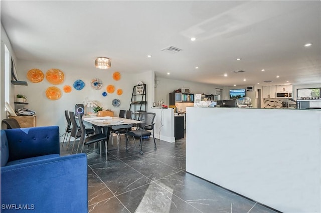 kitchen featuring white cabinetry