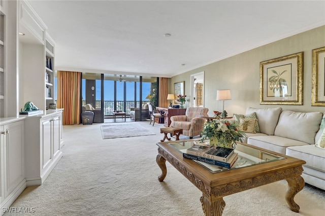 carpeted living room featuring a wall of windows and ornamental molding