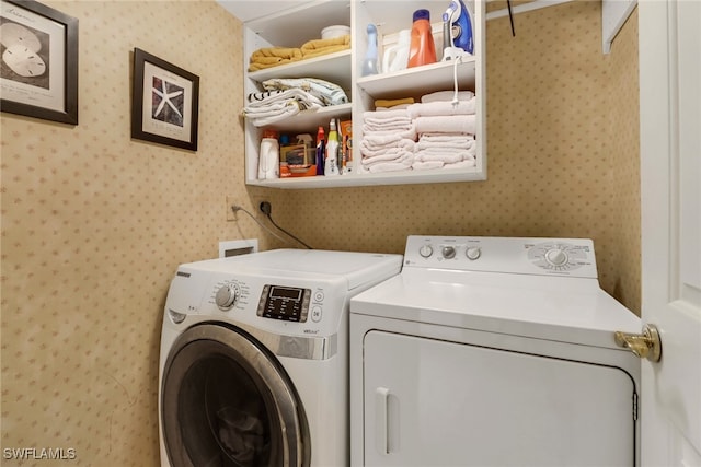 laundry area featuring washing machine and dryer