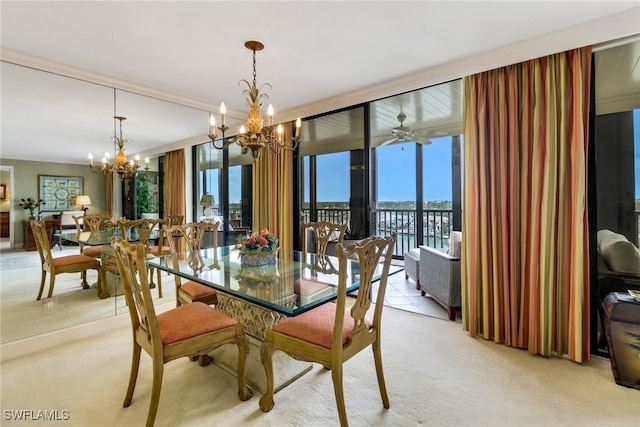 carpeted dining space with ceiling fan with notable chandelier