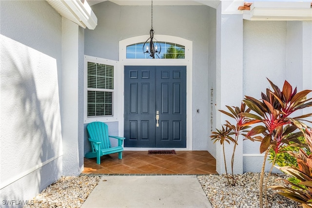 property entrance featuring covered porch