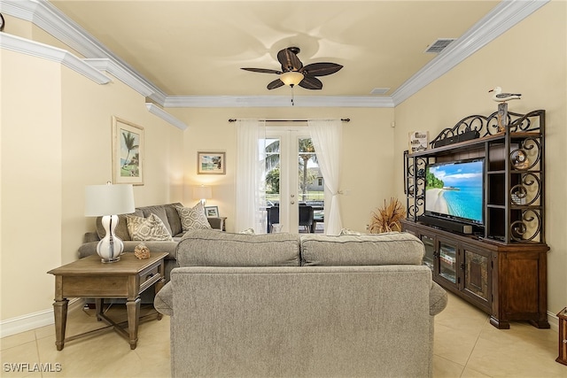 tiled living room featuring french doors, ceiling fan, and crown molding