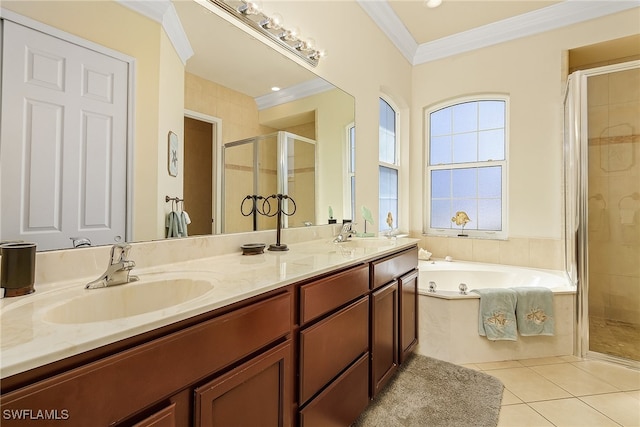 bathroom featuring tile patterned flooring, vanity, ornamental molding, and plus walk in shower