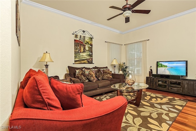 living room featuring crown molding, ceiling fan, and wood-type flooring