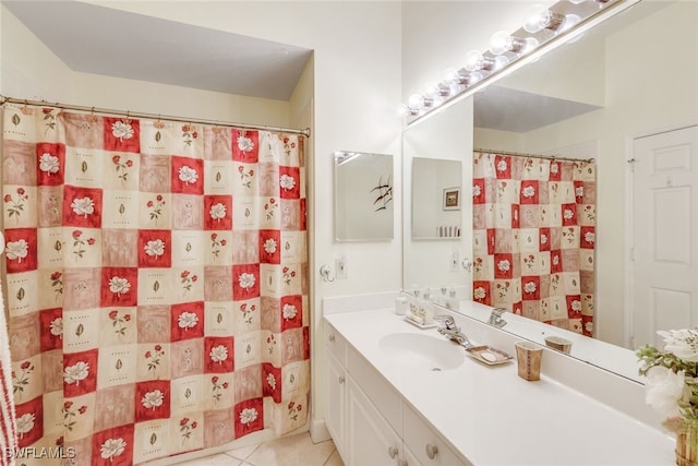 bathroom with tile patterned flooring, vanity, and a shower with shower curtain