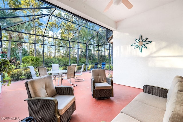 view of patio with a lanai and ceiling fan