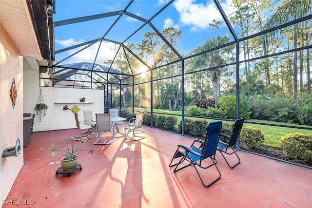 view of patio with a lanai