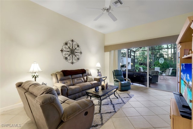 living room with ceiling fan and light tile patterned floors