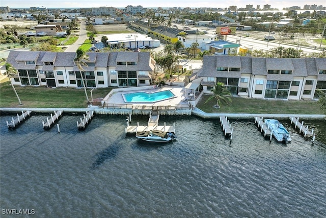 bird's eye view with a water view